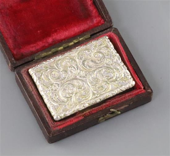 A George IV silver gilt rectangular vinaigrette by Nathaniel Mills, in original fitted leather box, 38mm.